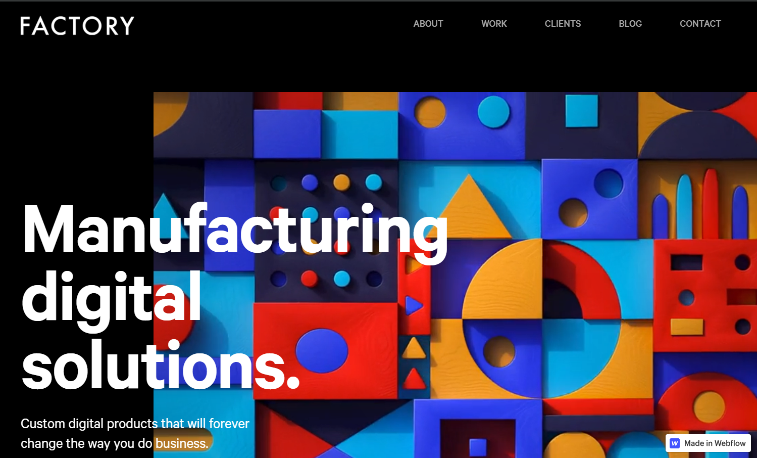 Factory homepage showing a background animation of colored blocks and the headline “Manufacturing digital solutions.”
