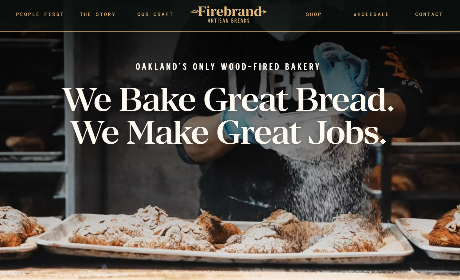Firebrand homepage showing a background video of a baker sprinkling powdered sugar on croissants and the text “We Bake Great Bread. We Make Great Jobs.”