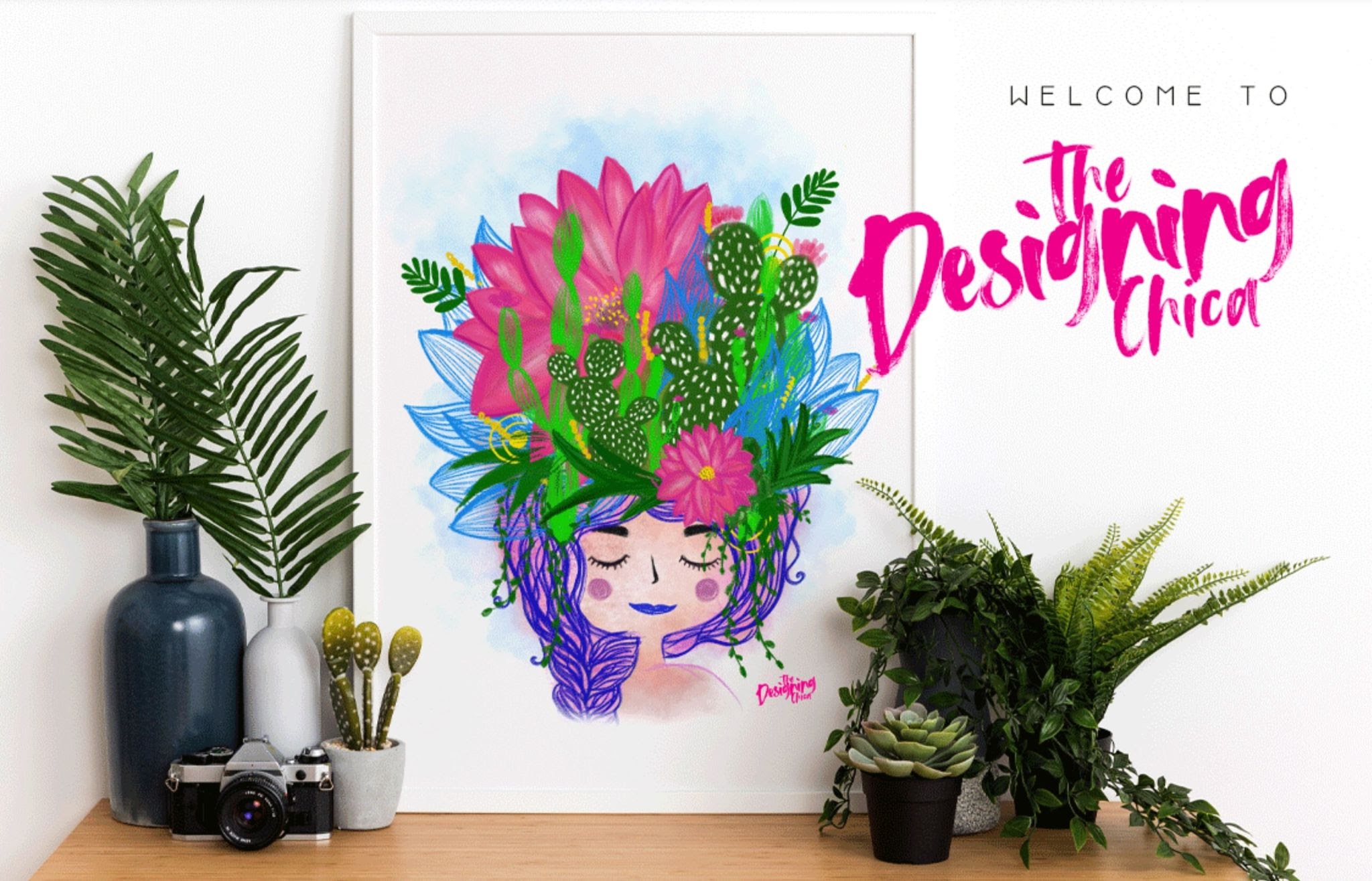The Designing Chica homepage, featuring a colorful drawing of a smiling woman, surrounded by plants.