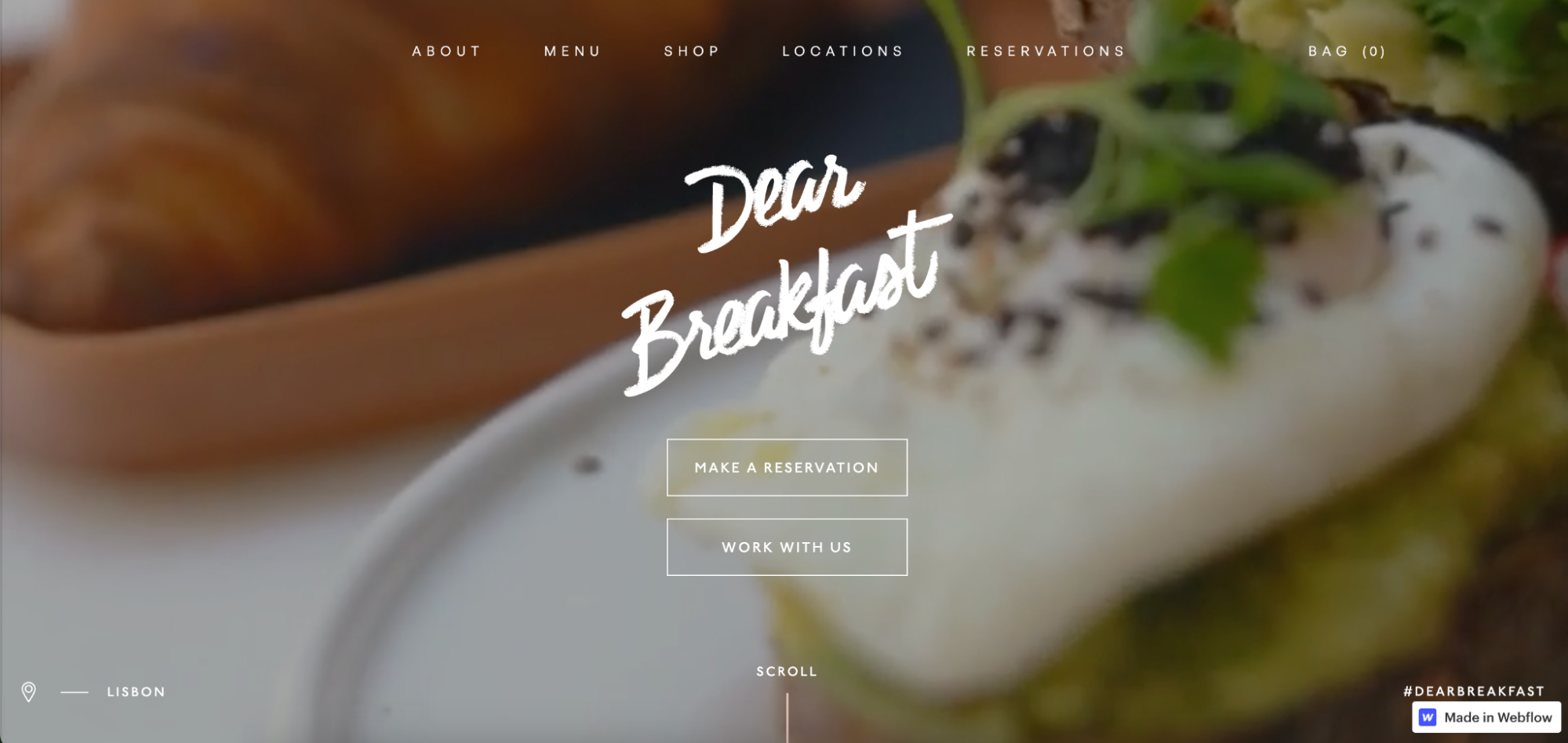 A screenshot of the Dear Breakfast Lisbon website’s landing page. The background is a detailed photo of a poached egg topped with black sesame seeds and microgreens.