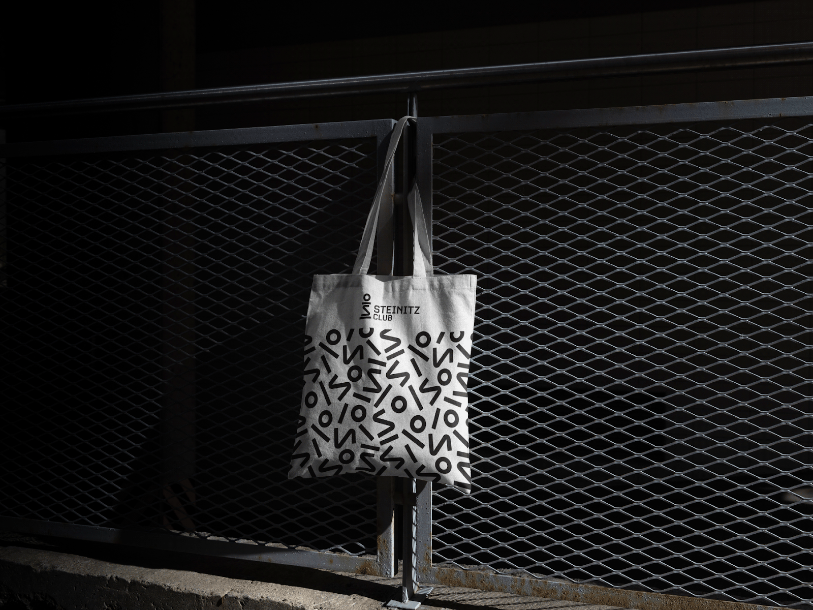 An image of Steinitz Chess Club’s branding on a bag in black and white.