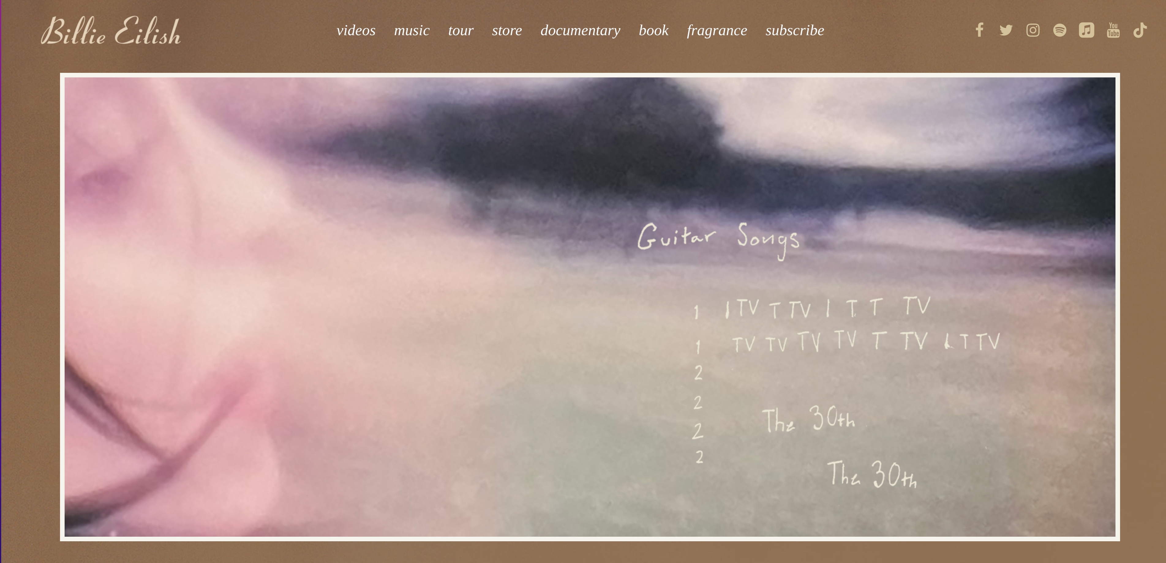 Billie Eilish homepage. Brown background. Blurry photo with scribbled handwriting "Guitar songs"