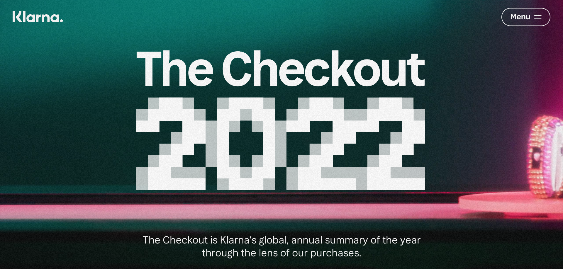 A screenshot of The Checkout’s website with the text “The Checkout 2022” over a picture of a hat