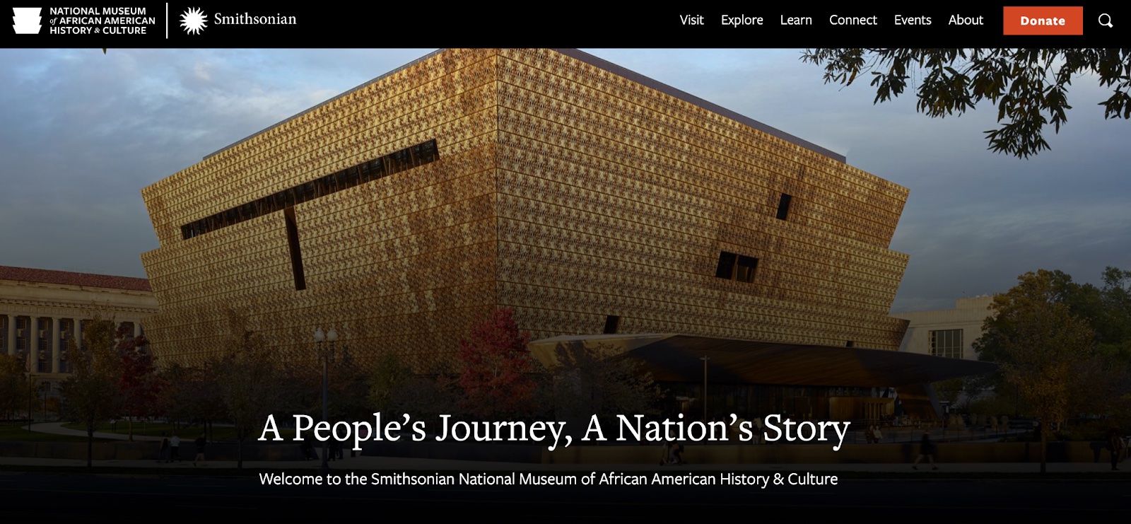 A screenshot of the homepage for the National Museum of African American History & Culture, featuring Joshua Darden's "Freight" typeface throughout. The header image is of the museum with the text "A People's Journey, a Nations Story."