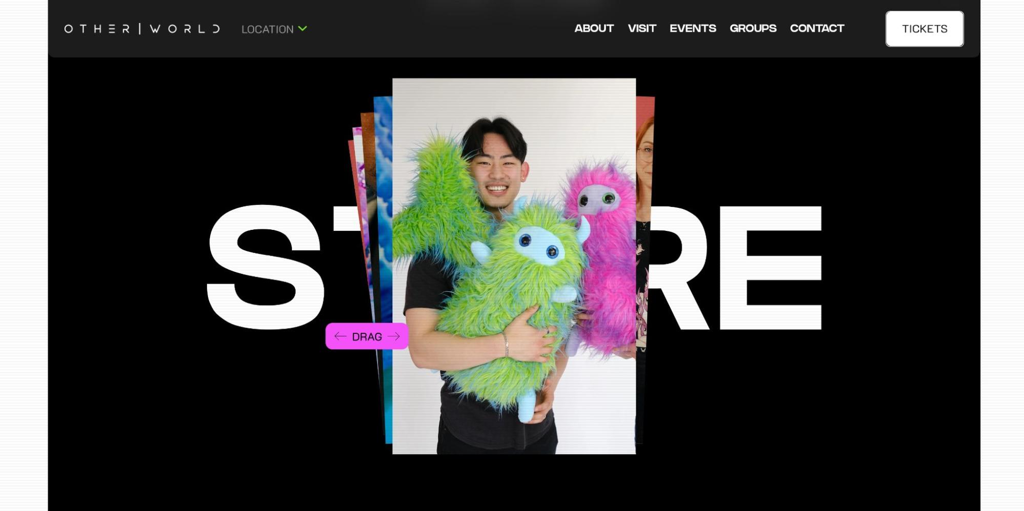 Otherworld website. Black background. Center: Image of smiling man holding green stuffed animal, additional images fanned out images behind.