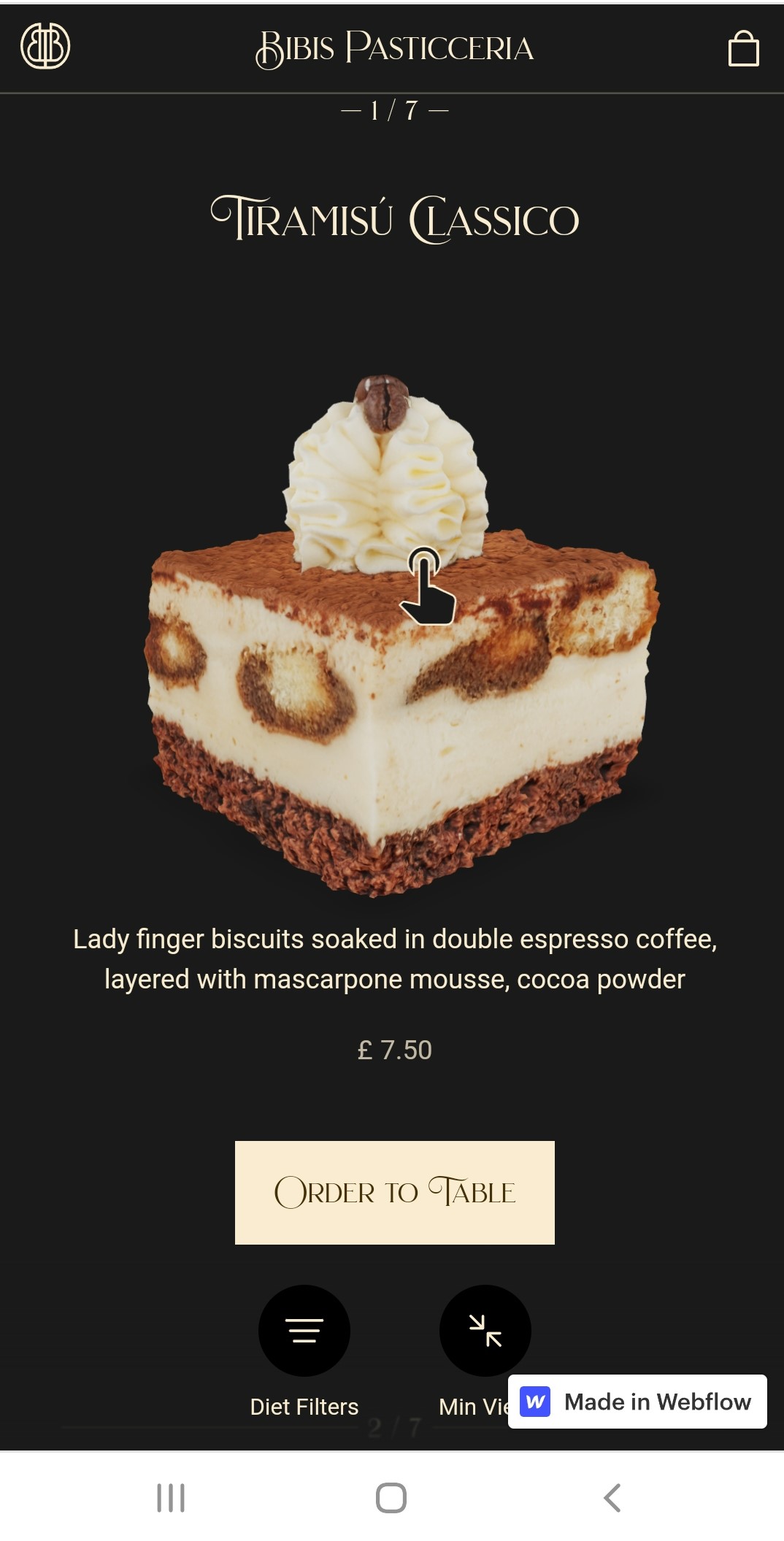 The Bibis Pasticceria dessert menu mobile site, showing an image of a slice of tiramisu, an order to table button, and a description of the dessert that says “Lady finger biscuits soaked in double espresso coffee, layered with mascarpone mousse, cocoa powder.”