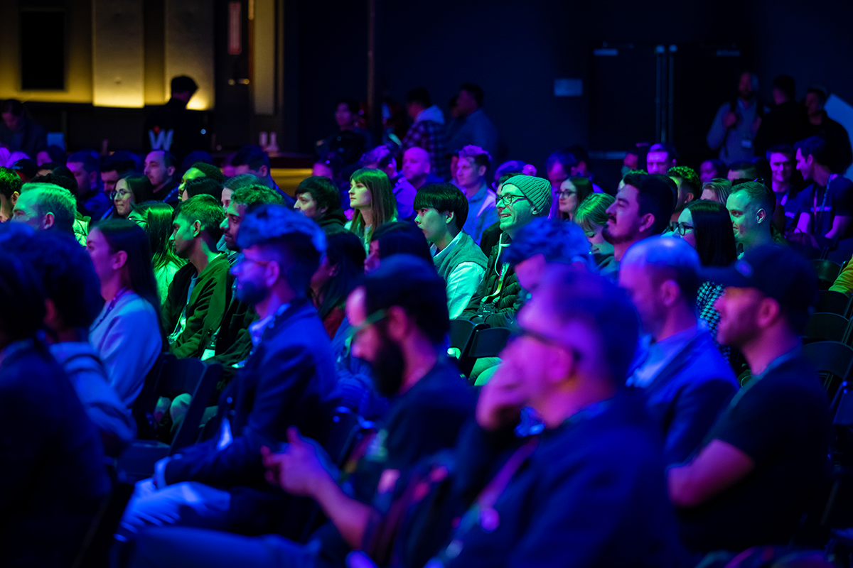 An image of the crowd at Webflow Conf 2022 with increased vibrance.