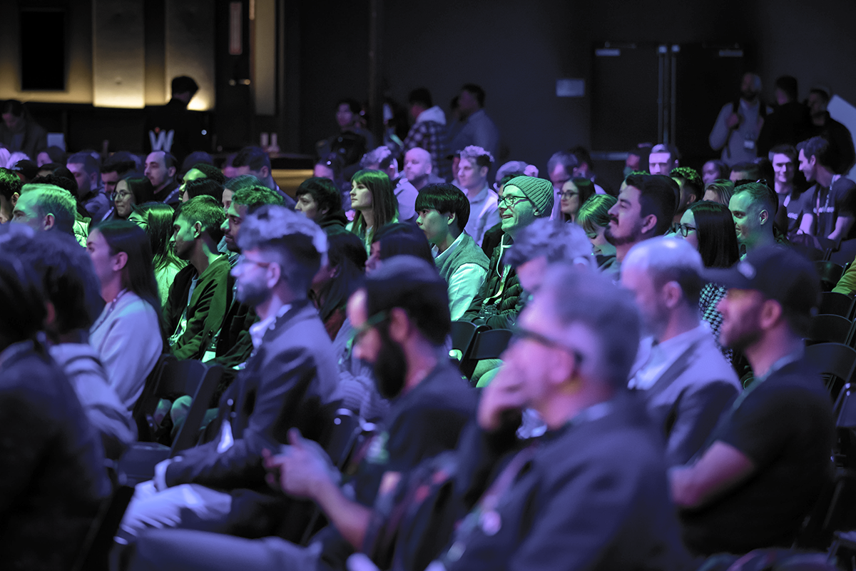 An image of the crowd at Webflow Conf 2022 with decreased vibrance.