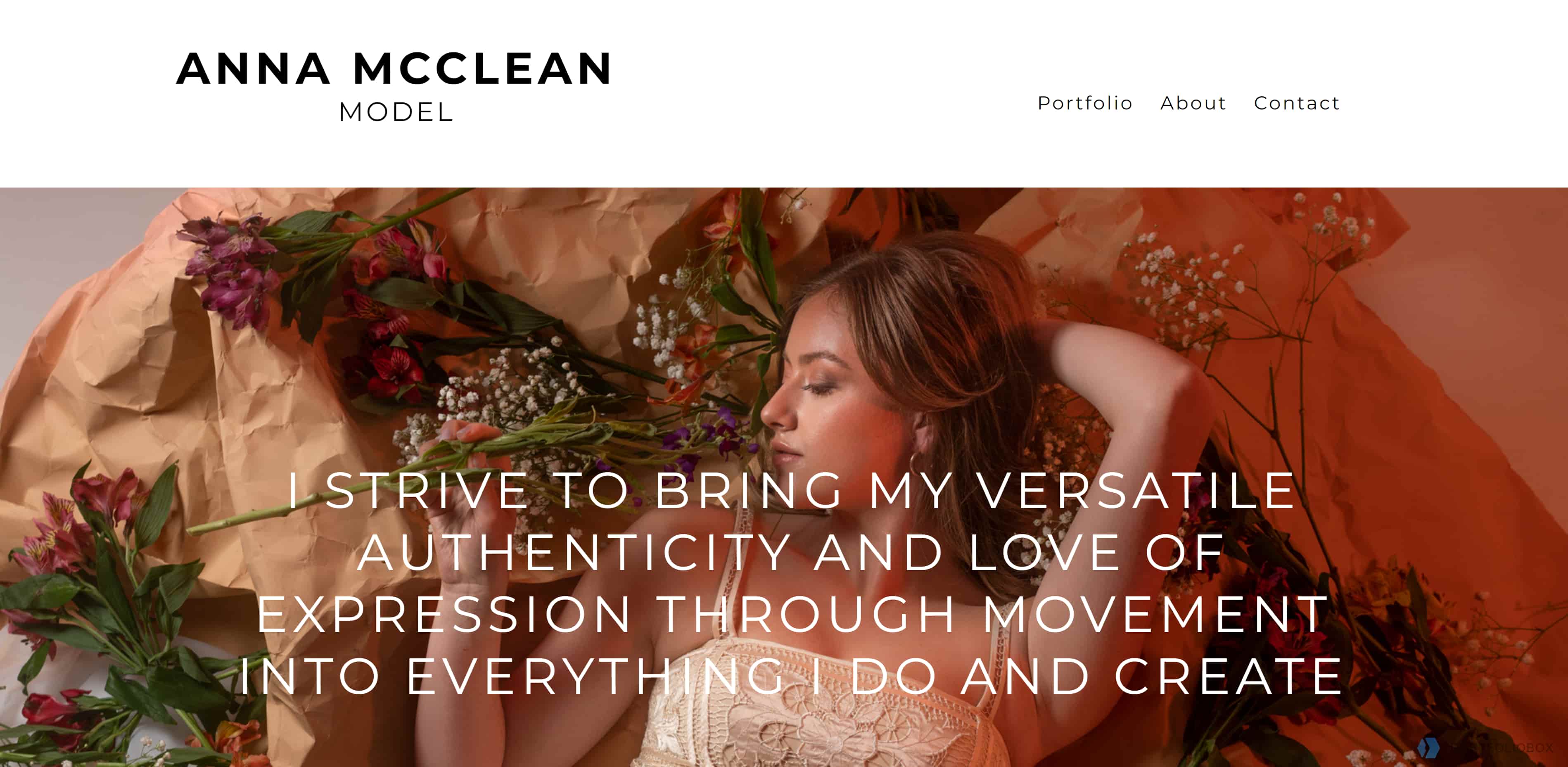 A screenshot of Anna McClean’s homepage featuring a menu in the top right corner and a header image of Anna lying with flowers surrounding her with overlapping text