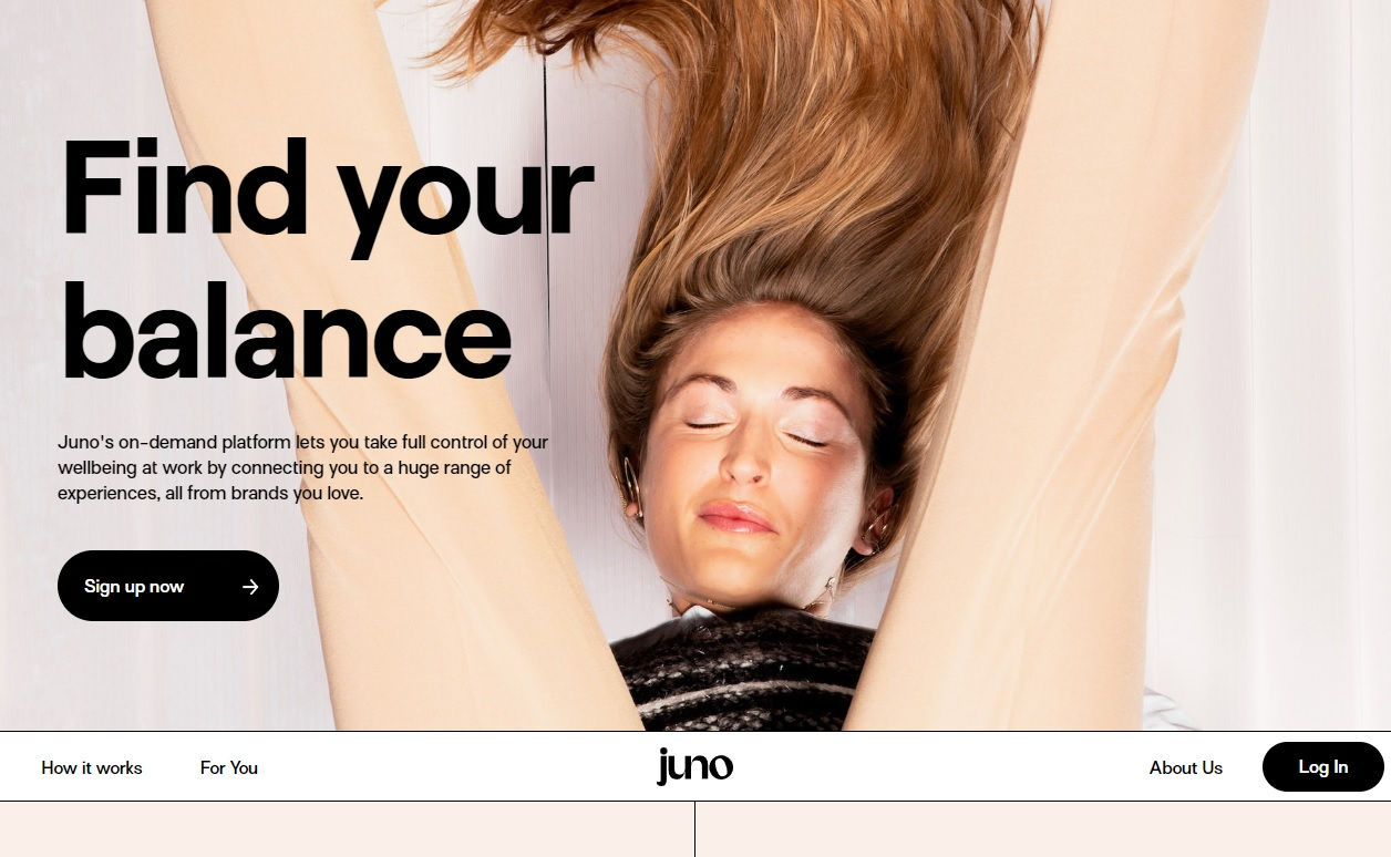 A picture of an upside-down woman bending over and the text “Find your balance” on the left-hand side of the page.