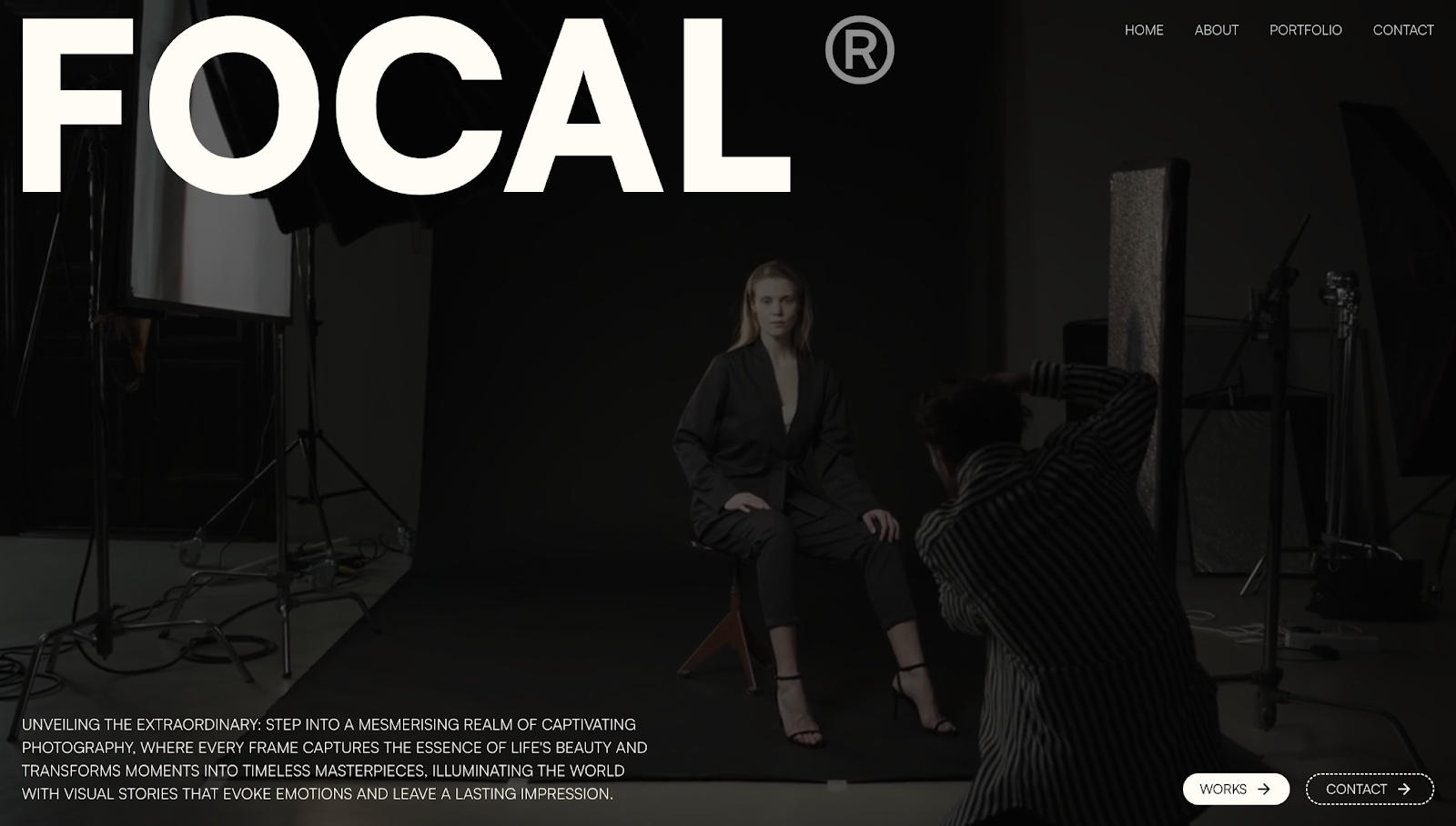 The Focal Photography website has a black screen overlay on a looping photoshoot video with the text “Focal” in white.