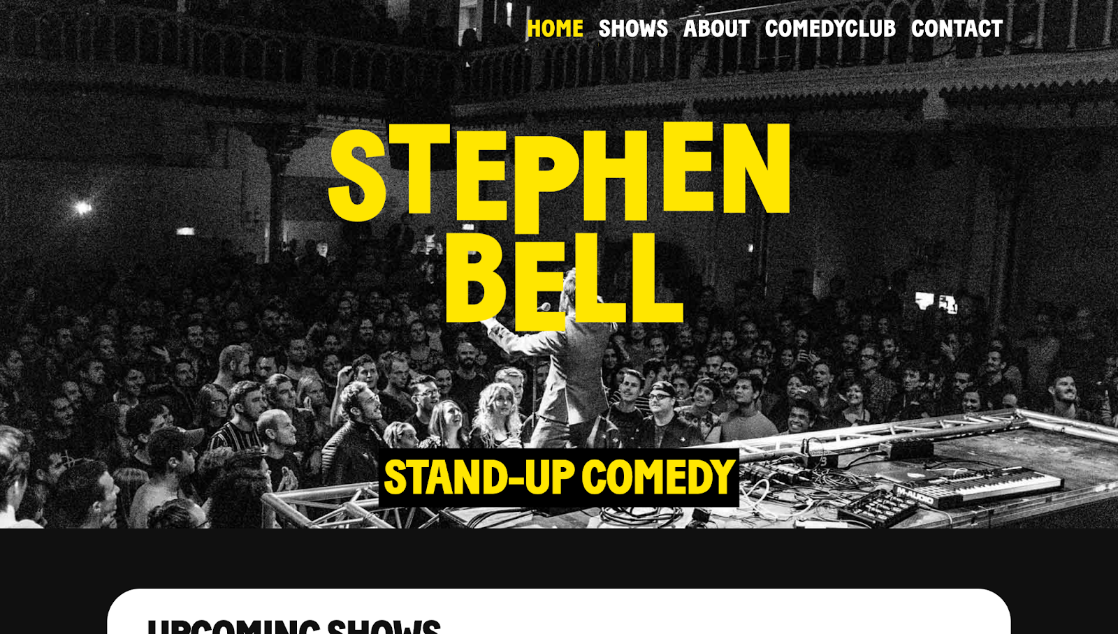 Stephen Bell’s website has a monochromatic image of a live audience with the text “STEPHEN BELL” in bright yellow letters.