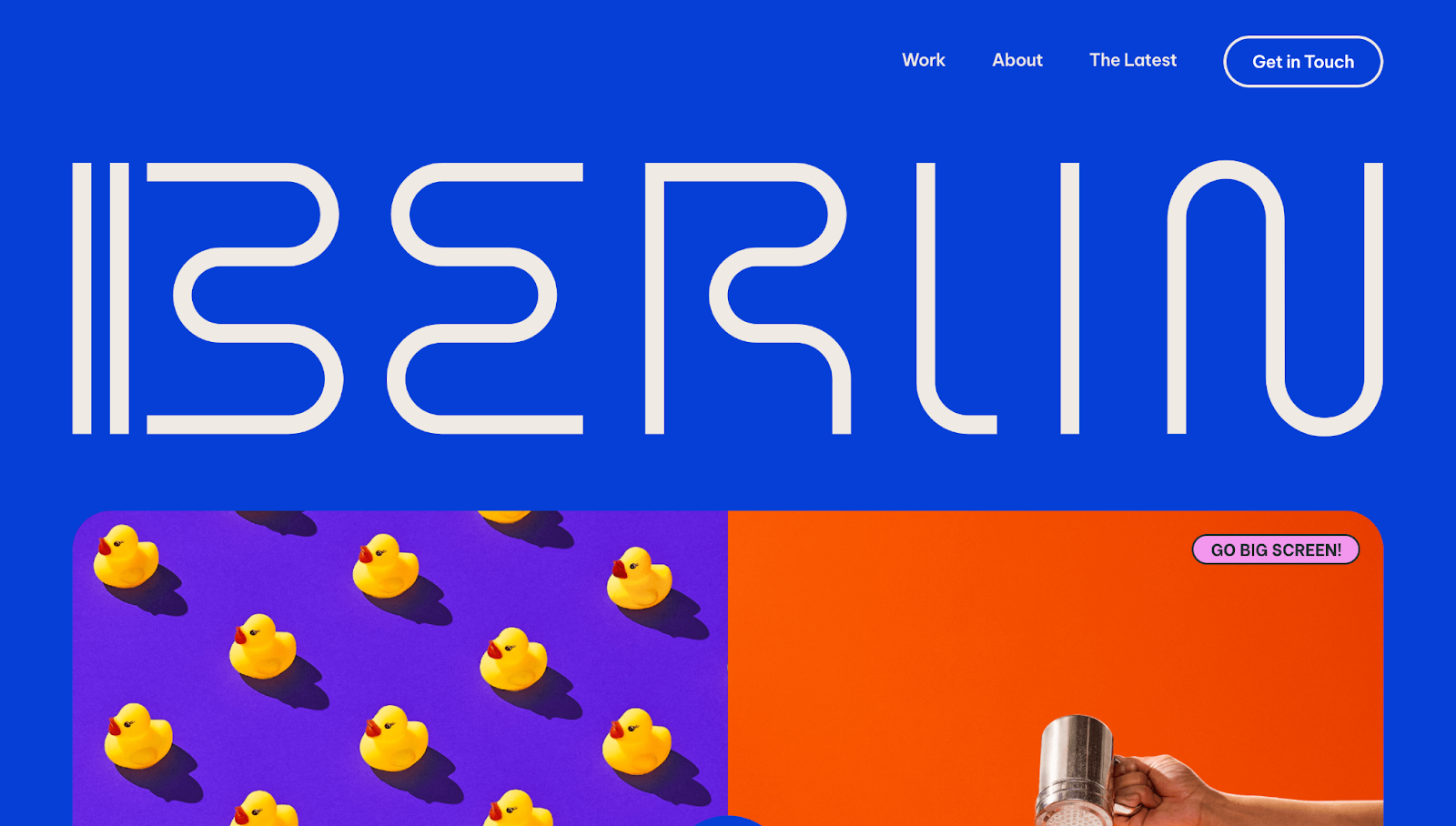 Berlin Communications’ header design has a vibrant blue background with contrasting visuals, navigation options, and the company’s logo in stylized typography.