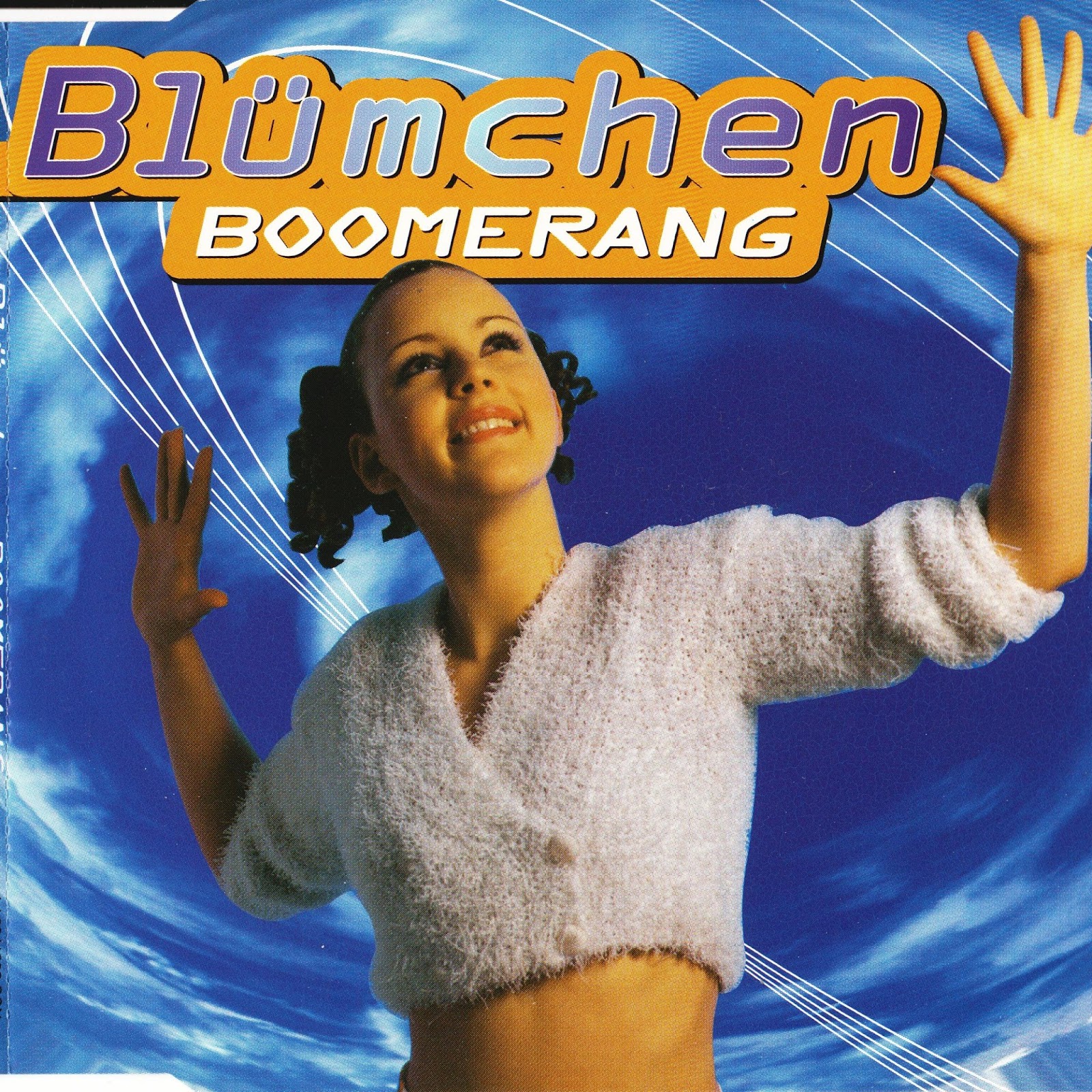 An ad with a woman, tinted in yellow, standing and smiling staring upwards with her hands spread out.