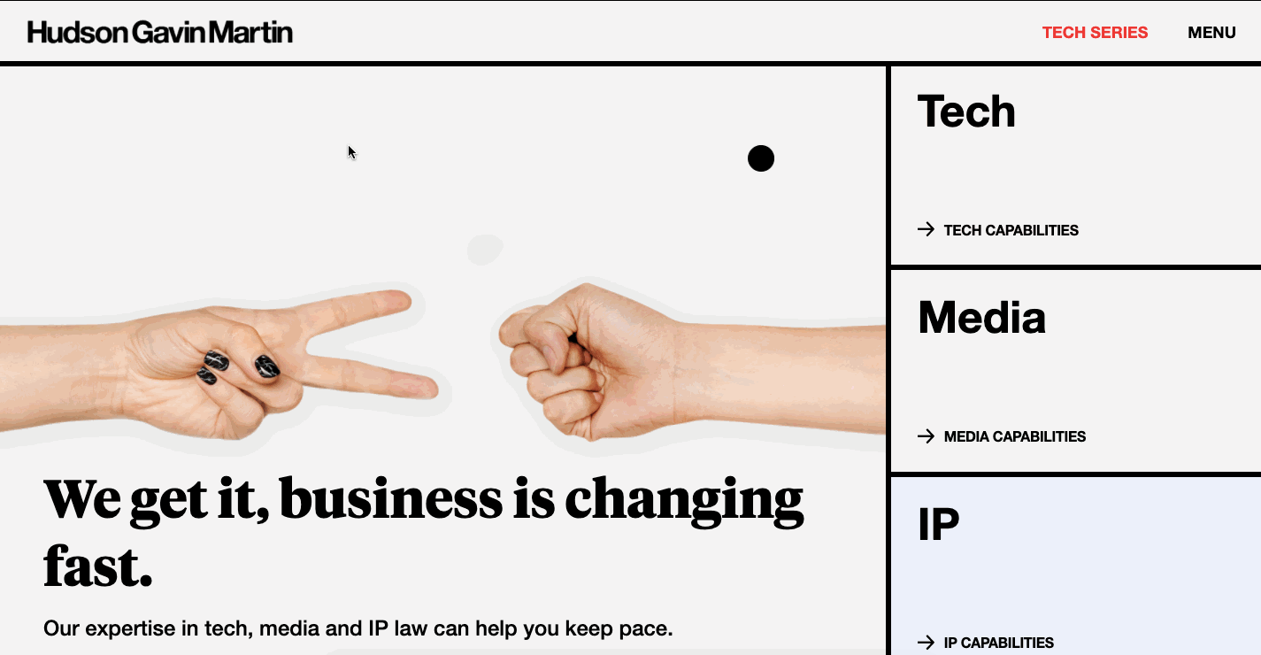 Hudson Gavin and Martin's home page adds interest with a bold black circle cursor.
