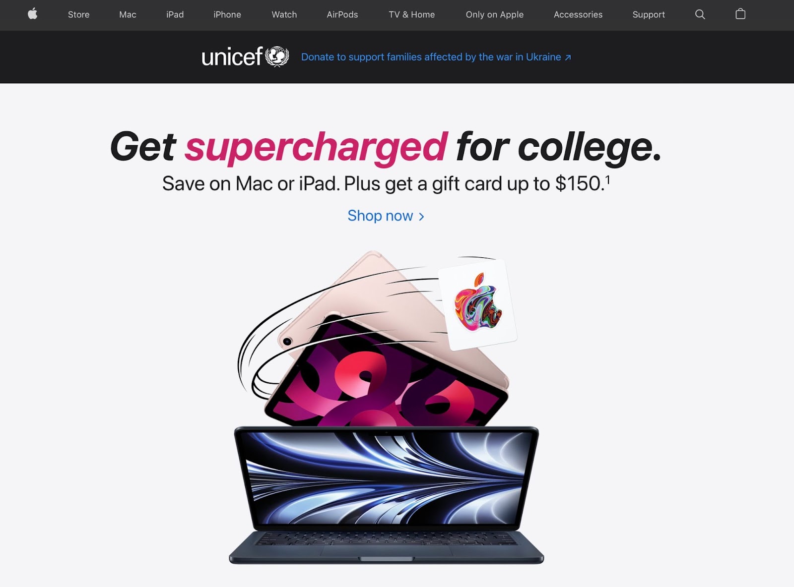 The Apple homepage in March 2022, featuring a homepage banner drawing attention to the crisis in Ukraine to encourage site visitors to donate to Unicef to offer relief support. The hero image is a CTA for college students, reading "Get supercharged for college" above a hero image of a Macbook and two iPads collated. 