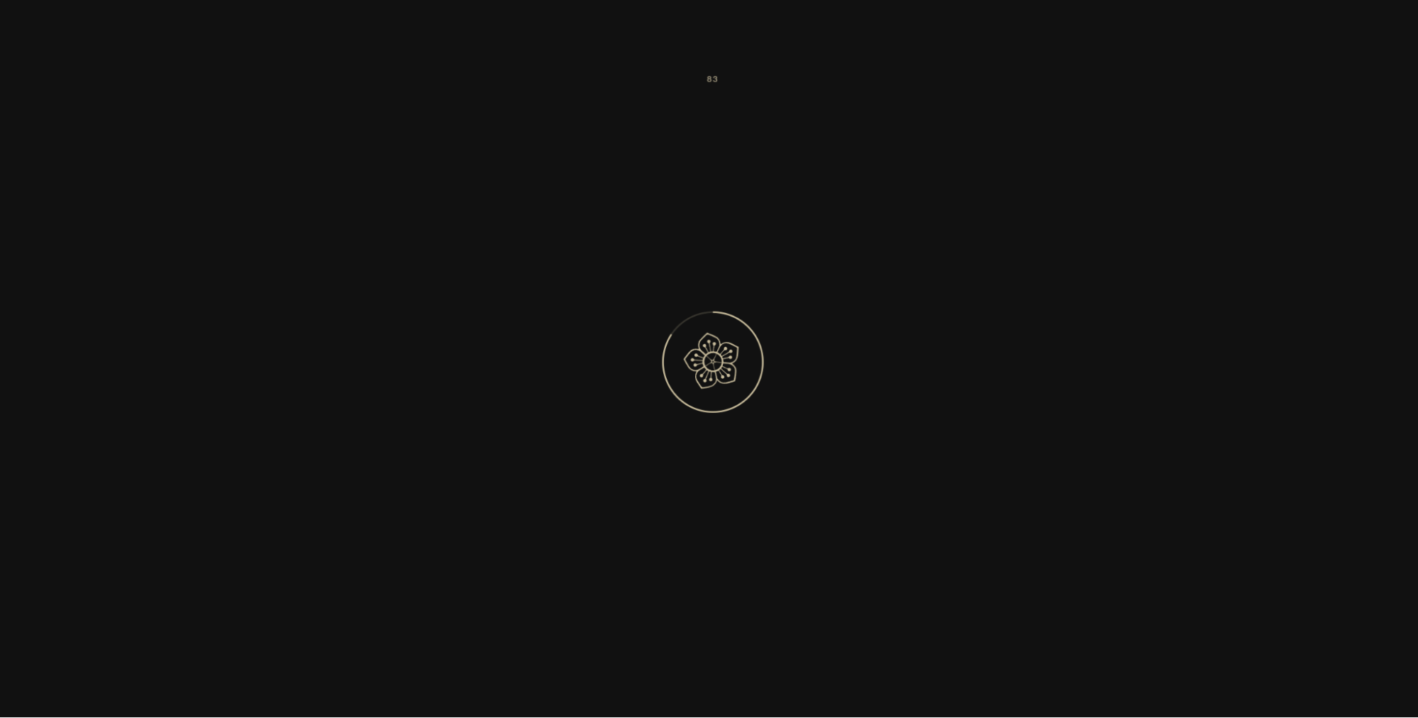 Screenshot of the animation preloader for Glow Flow Yoga’s website, which features a count-up number atop a highlight circling the logo, functioning like a spinner, while the embedded flower motif gently rotates.