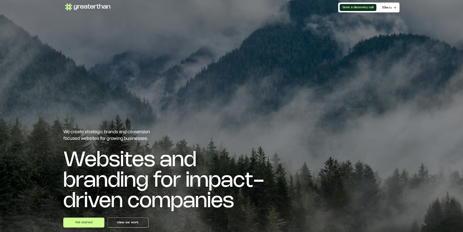 The Greaterthan website starts with a full-screen image of a foggy forest landscape behind the headline “Websites and branding for impact-driven companies.”