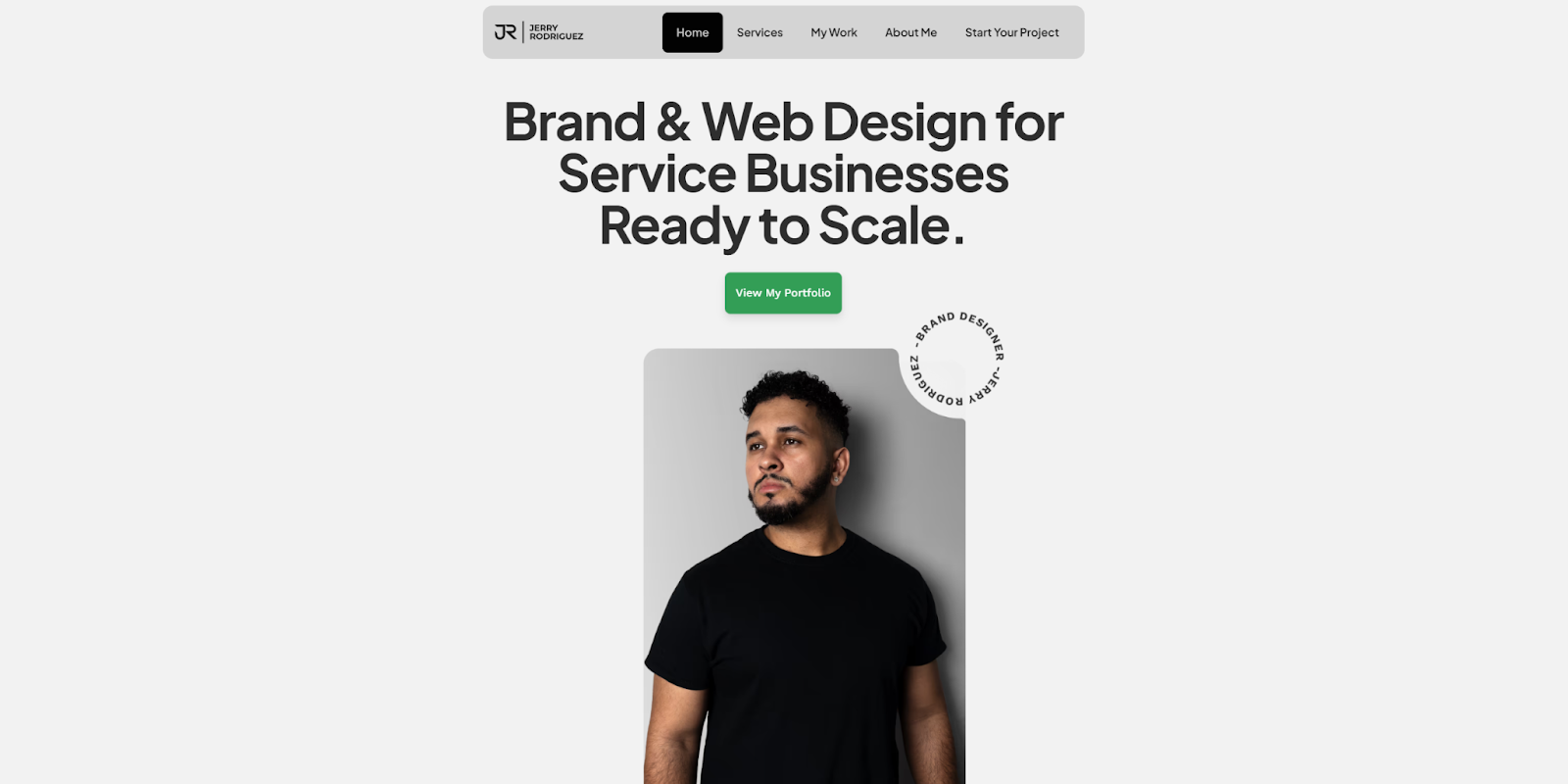 Jerry Rodriguez’s portfolio site begins with the headline “Brand & web design for service businesses ready to scale” above an image of Jerry standing against a wall.