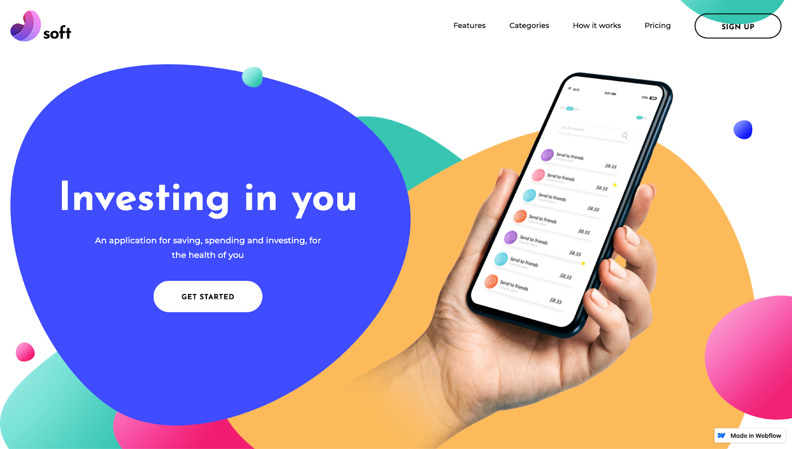 A screenshot of Soft’s app landing page template, showing abstract bubble shapes with a hand holding a smartphone.