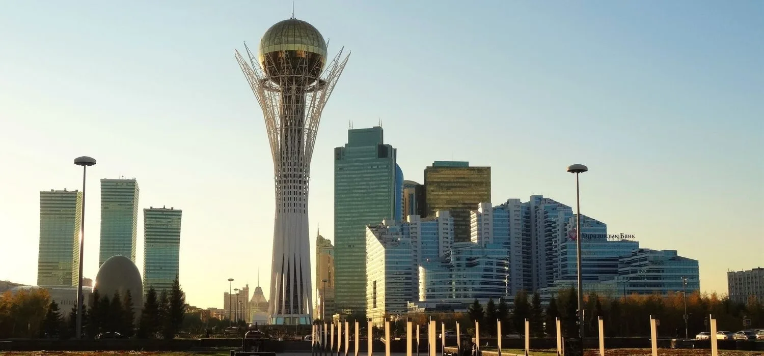 The Bayterek Tower and modern skyscrapers in financial centre Nur-Sultan, Kazakhstan