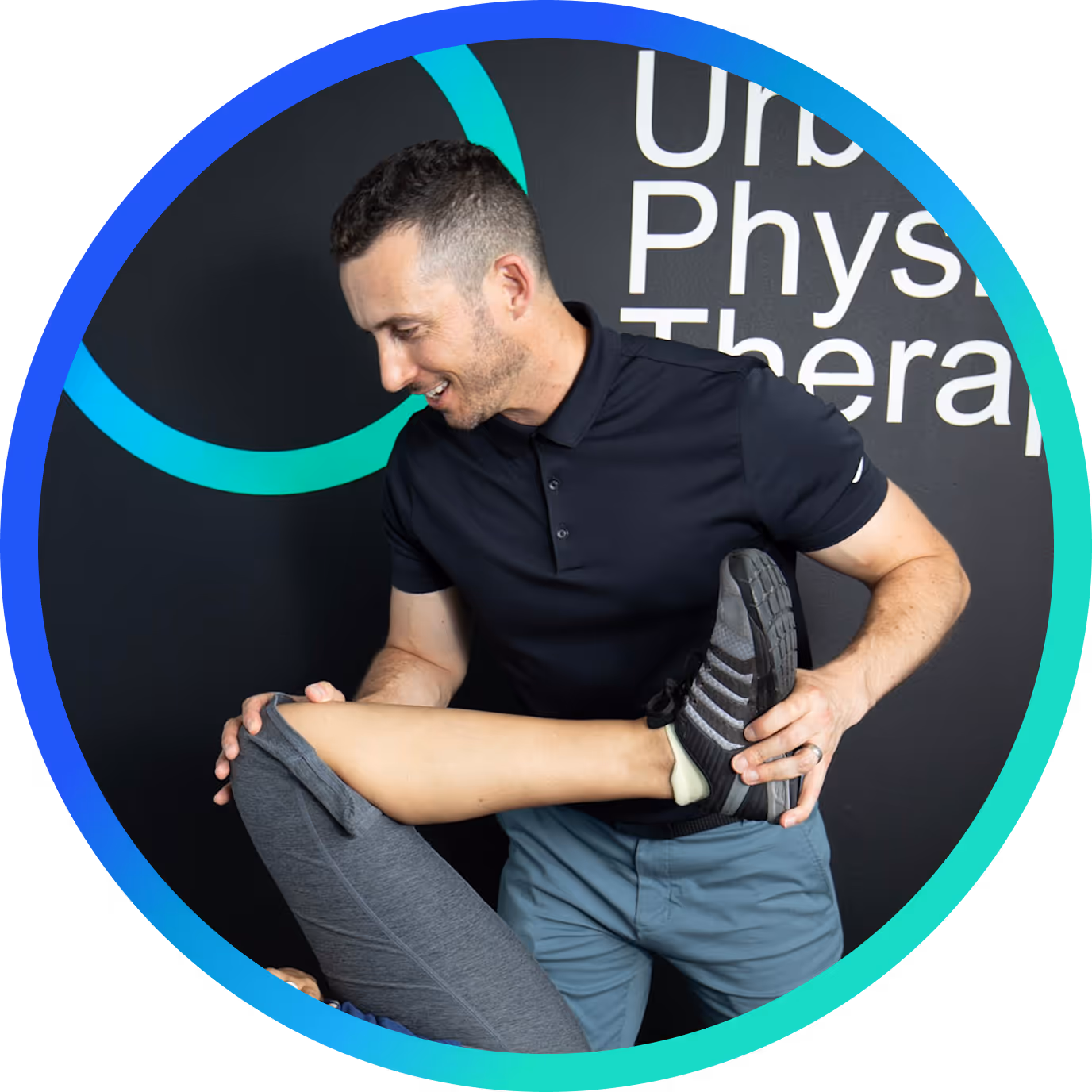 Eric performing manual therapy on a patient