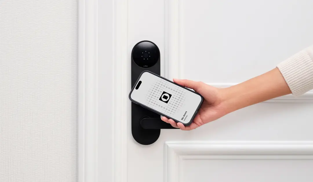 Residents moving into apartment with boxes, highlighting seamless move-in experience enabled by smart locks and digital access control systems