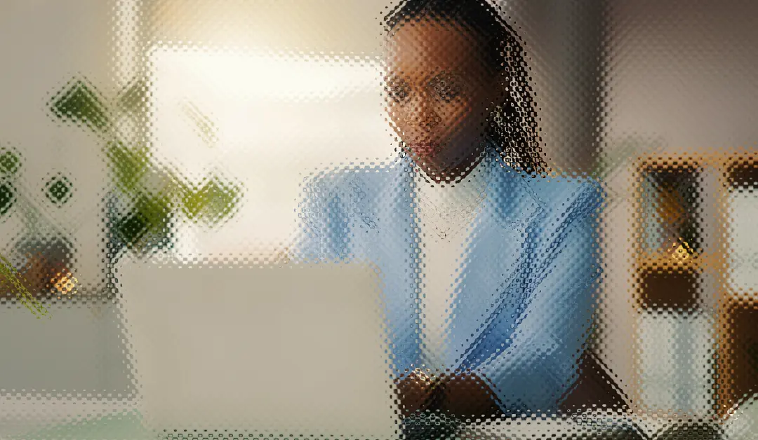 Property manager using a laptop to manage building operations and smart access systems