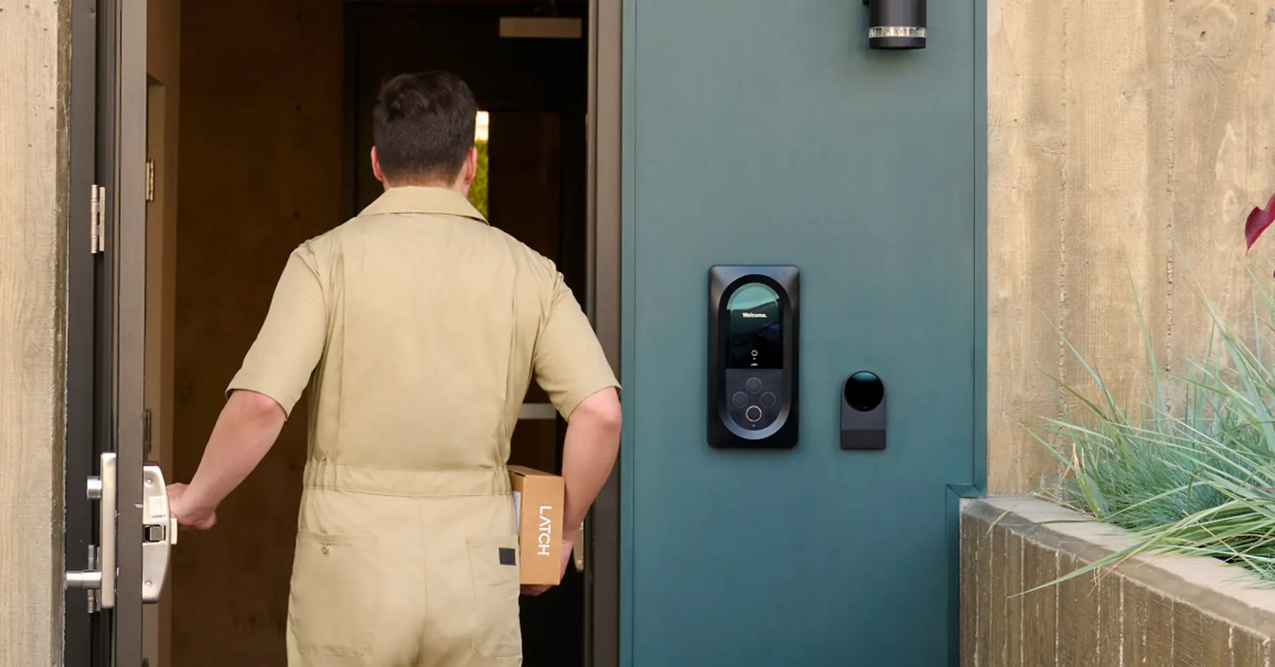 Delivery person entering a residential building using smart access control system and video intercom
