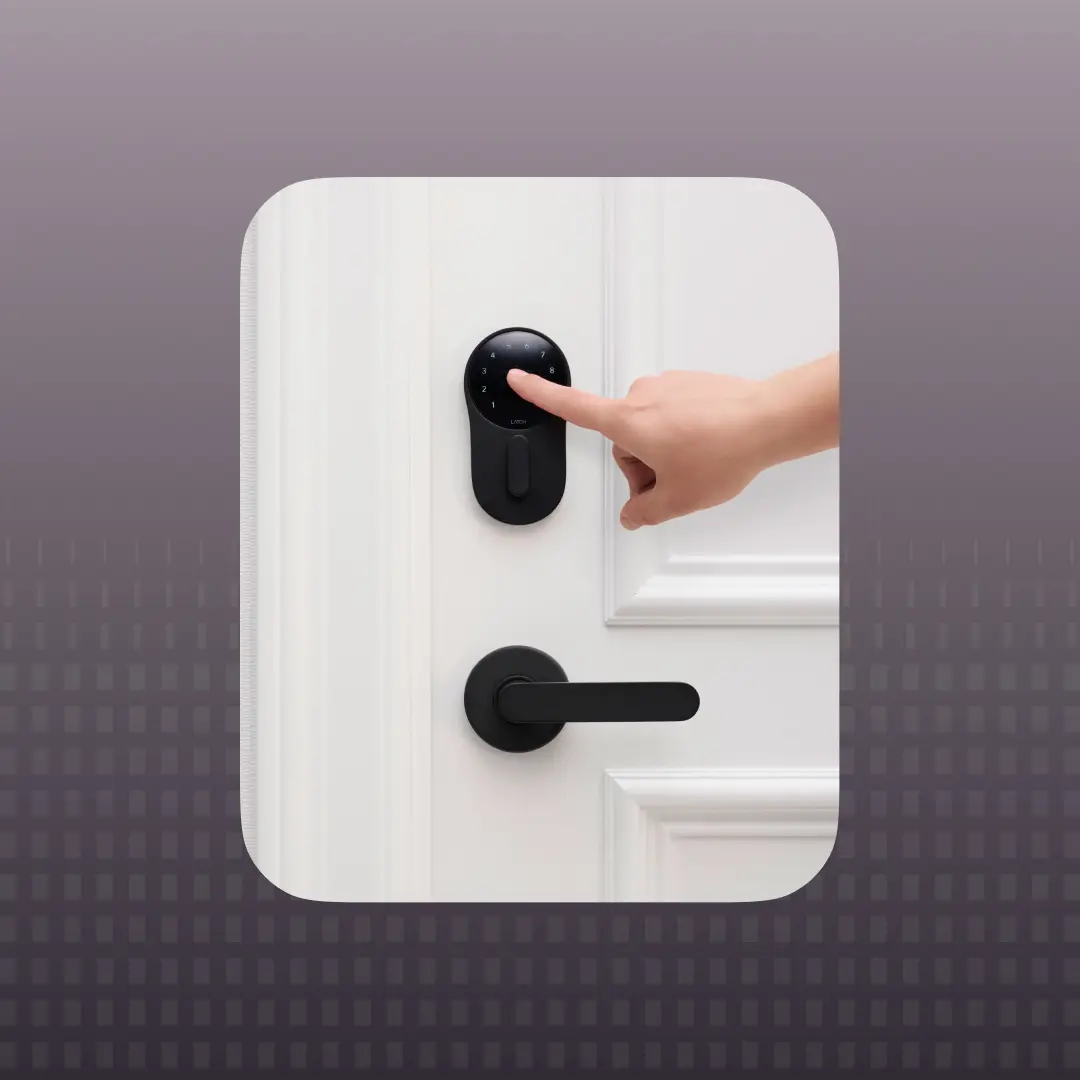 Resident entering code on smart lock for apartment door access