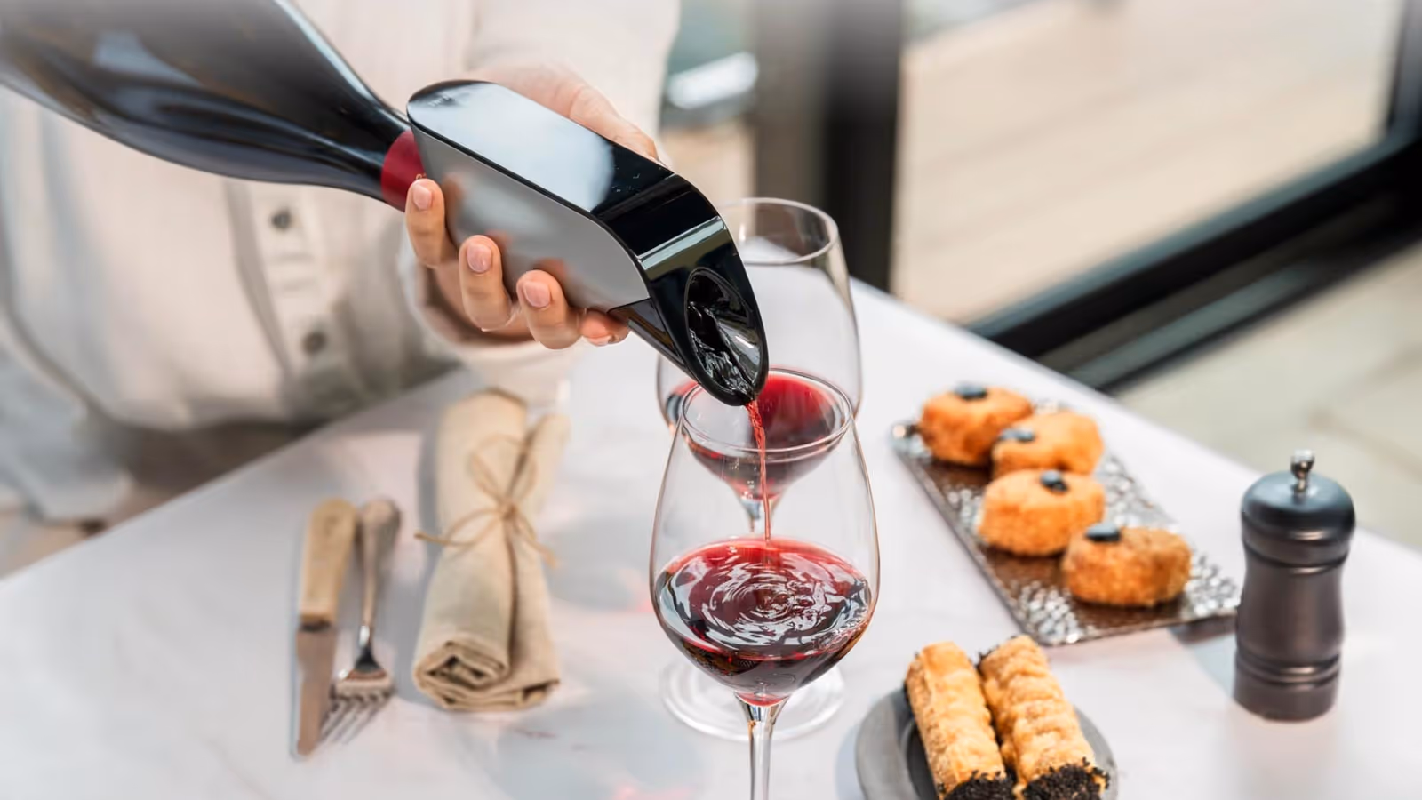Explore the Aveine wine aerator, enhancing wine flavor with precision aeration for wine enthusiasts in Dubai and the Gulf