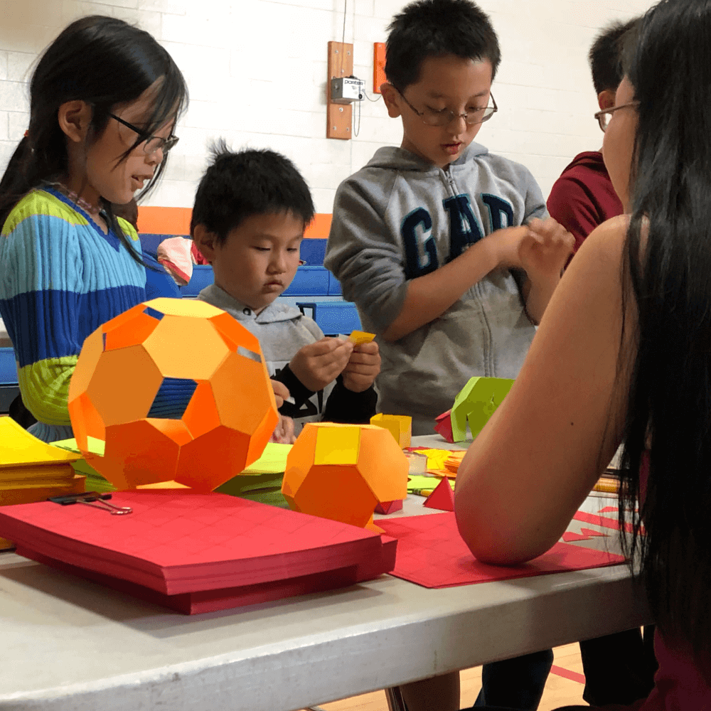 Children doing math in a Math Circle or After School Program