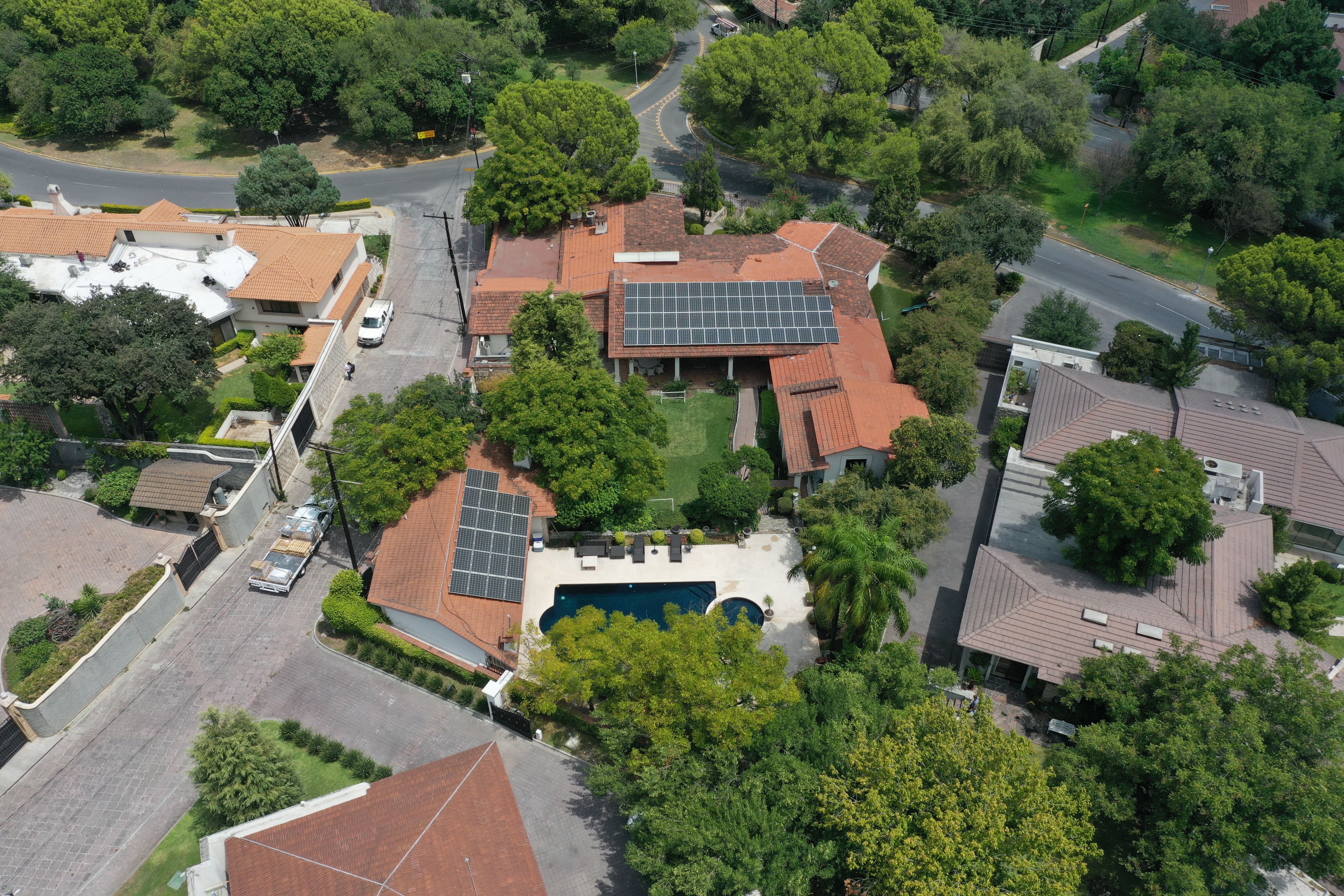 image of solar panels on rooftops for a green tech/cleantech company