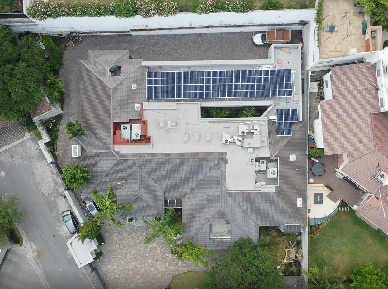 image of a modern home with solar panels