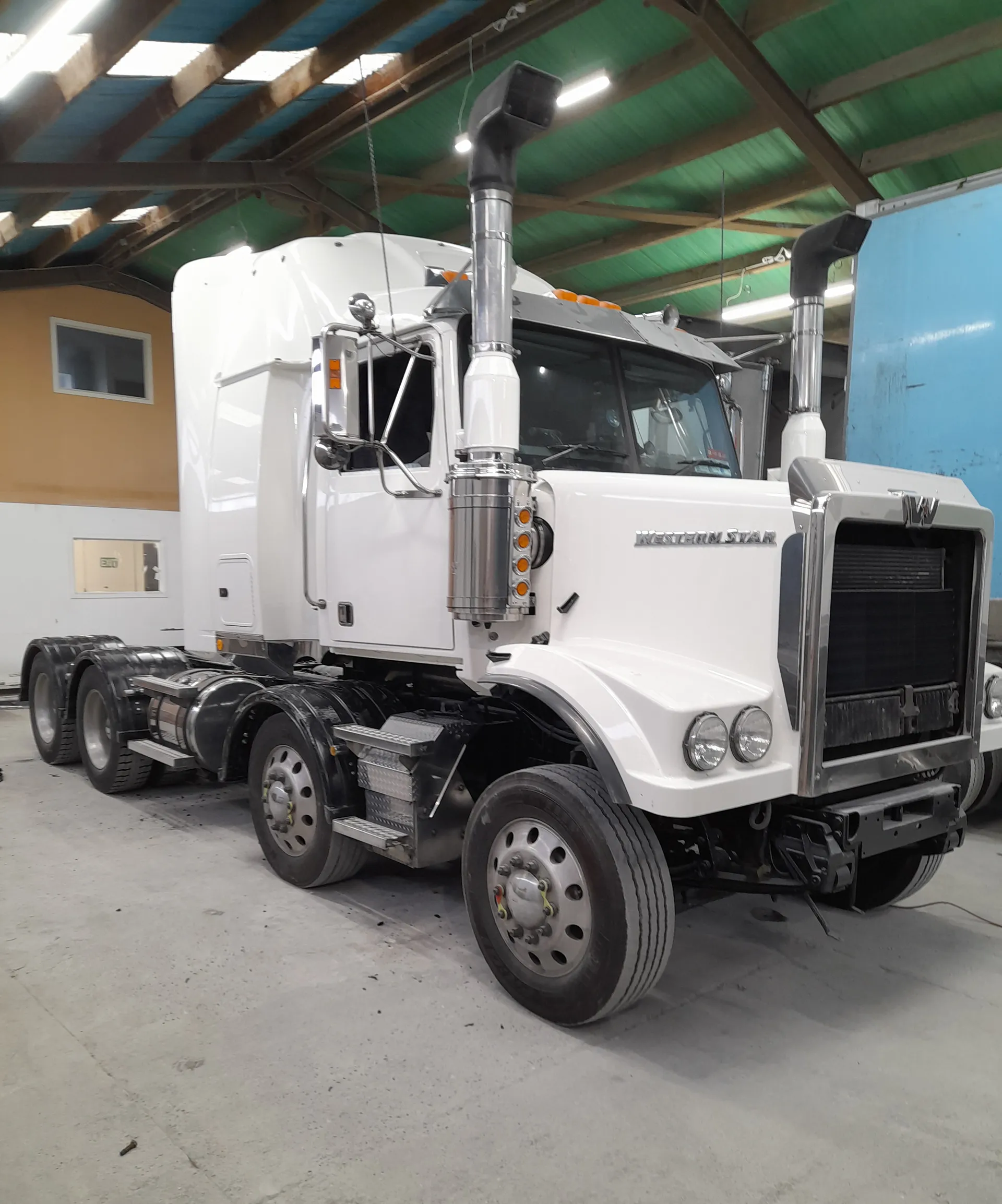 A truck in the BF Motorbody Repairs garage