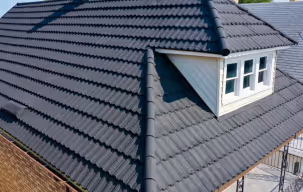Aerial view of various roofing styles, showcasing traditional and modern designs across different buildings.