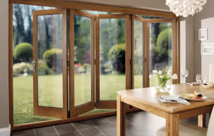 A dining room featuring sliding glass doors that open to an outdoor space, enhancing natural light and views.