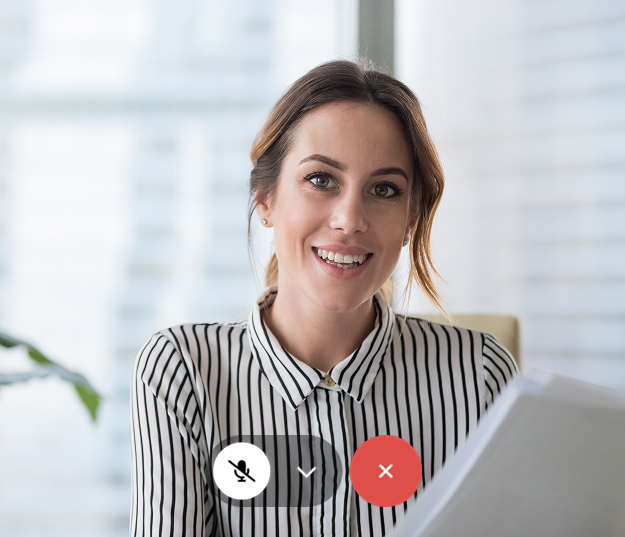 A women smiling in a video call