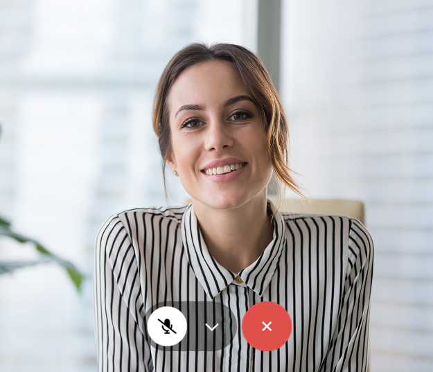 A women smiling in a video call