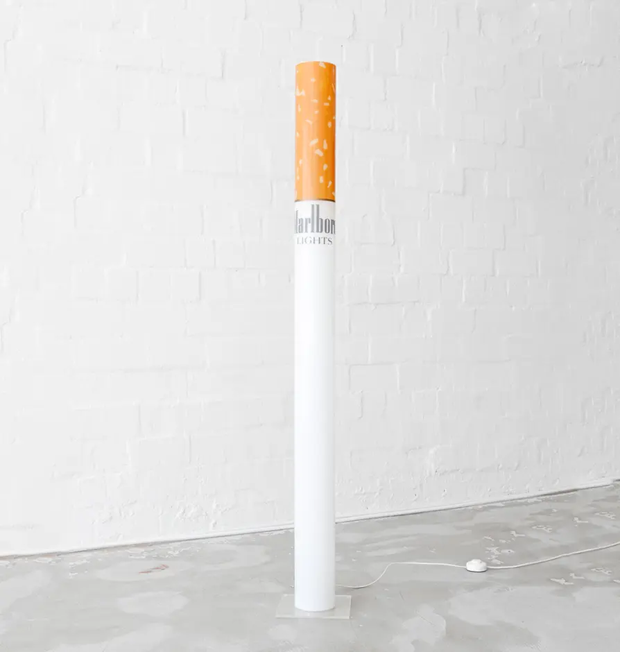 Floor lamp designed to resemble a Marlboro Lights cigarette