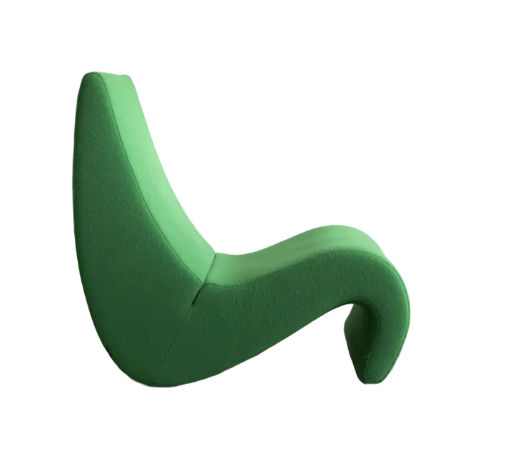 Sculptural green lounge chair with a wave-like shape and ergonomic curve