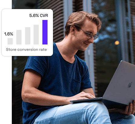 Person working on laptop at an eCommerce CRO agency
