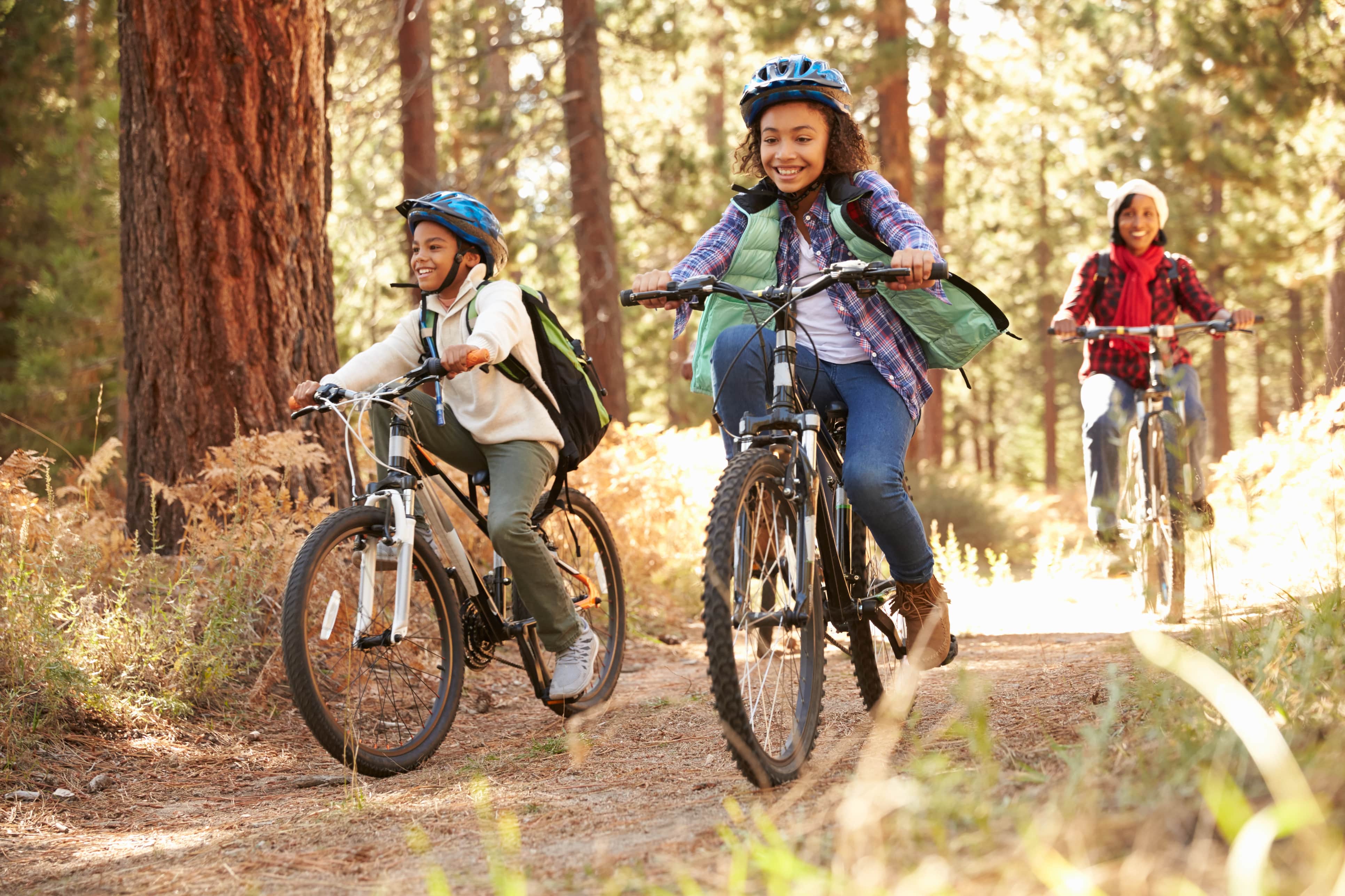 Children biking on a path