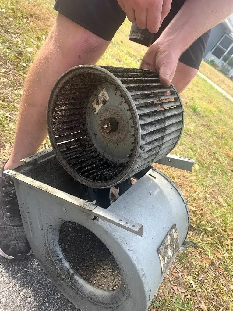 Technician inspecting home ventilation system, emphasizing maintenance for fresh air circulation