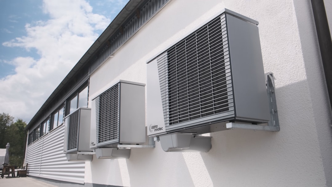 Ductless indoor air handler mounted in a modern Pittsburgh living room - central ac vs ductless mini split comparison Ductless indoor air handler mounted in a modern Pittsburgh living room - central ac vs ductless mini split comparison