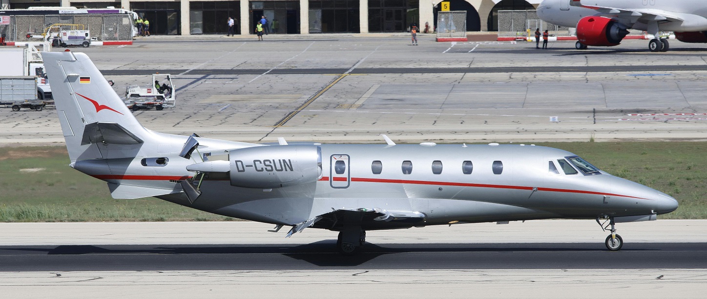 A grey private light jet
