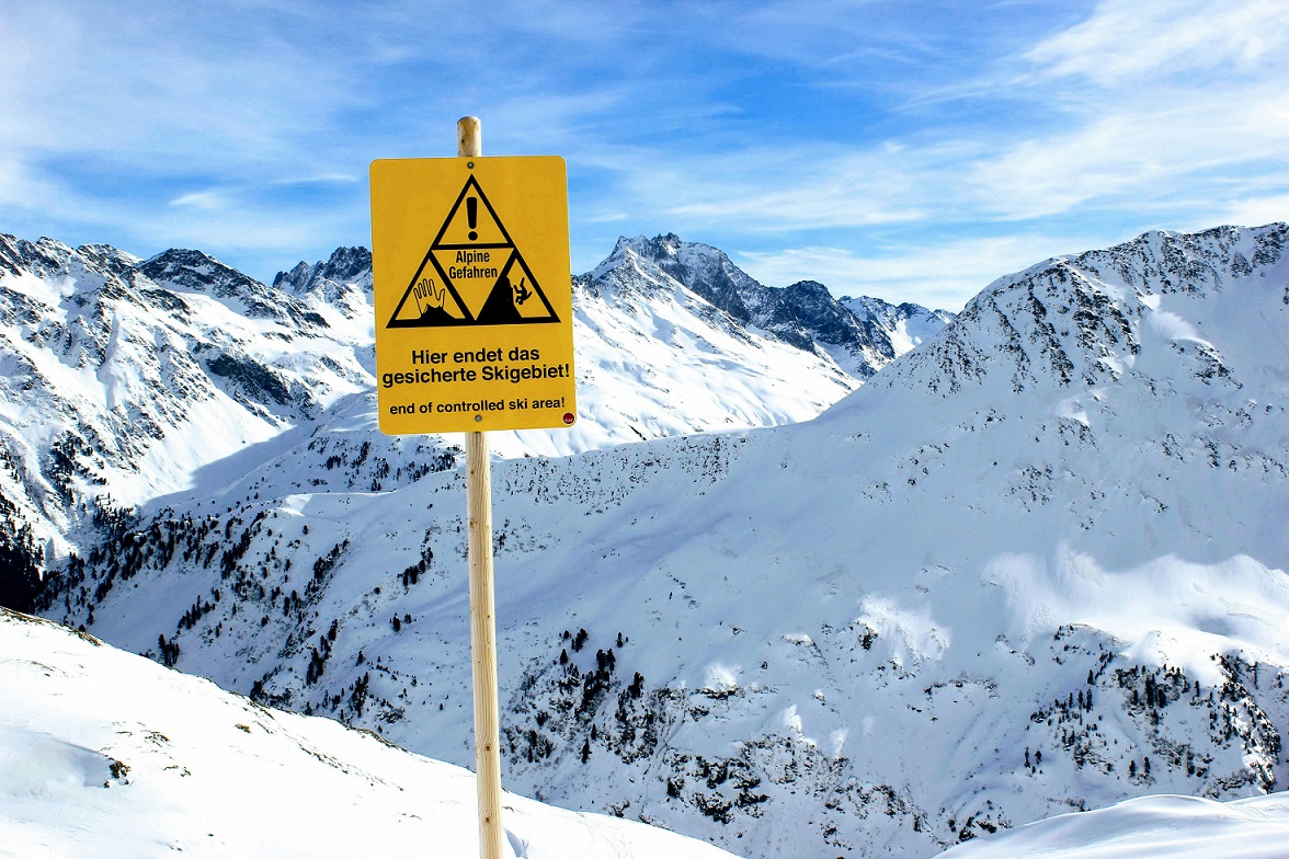 a yellow sign on the slopes of St Anton in Austria