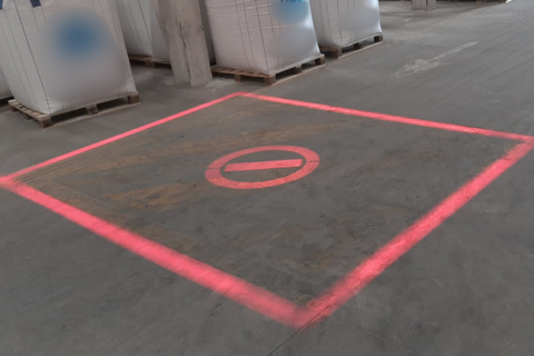 Custom gobo projector installed in manufacturing plant