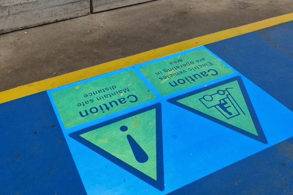 LED-projected floor markings in aerospace manufacturing facility