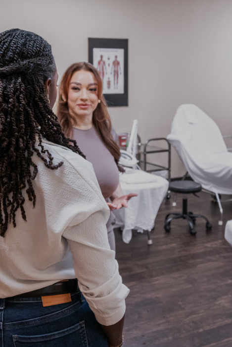 Prospective student touring The Skin + Makeup Institute campus